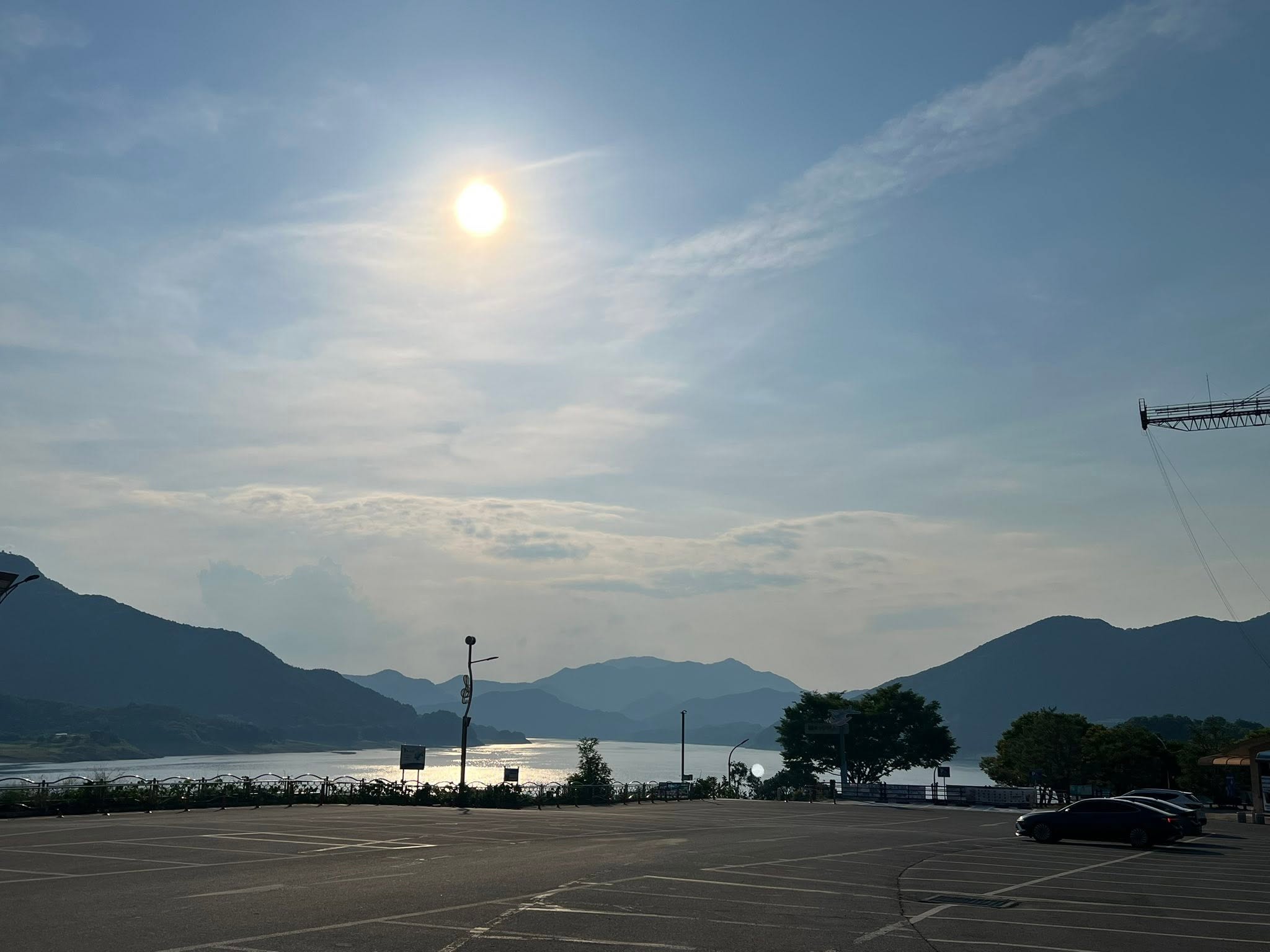 May be an image of lake, cloud, horizon and twilight