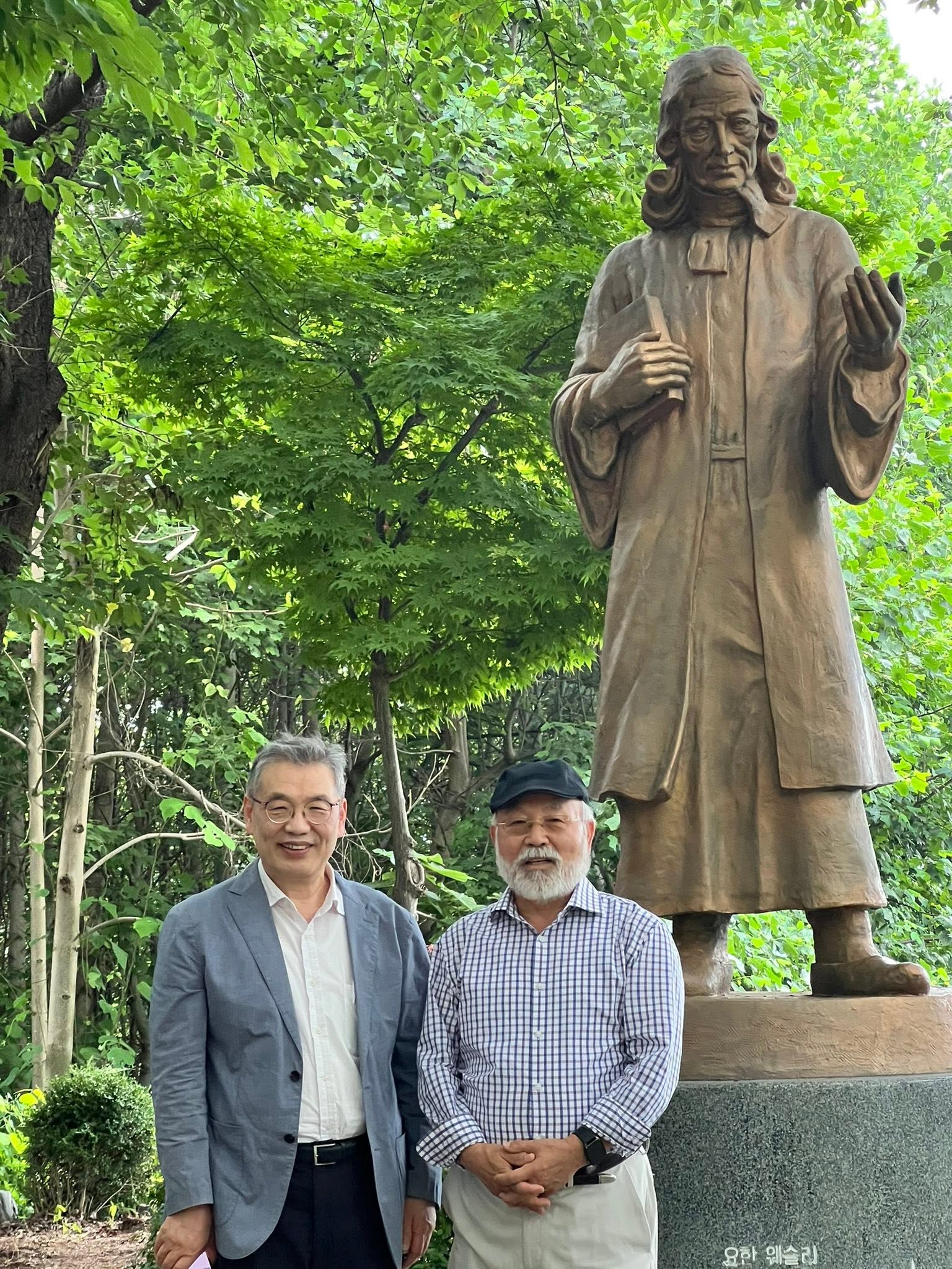 May be an image of monument and text that says '88 한 요한웨술리 하 웨 웨승리'