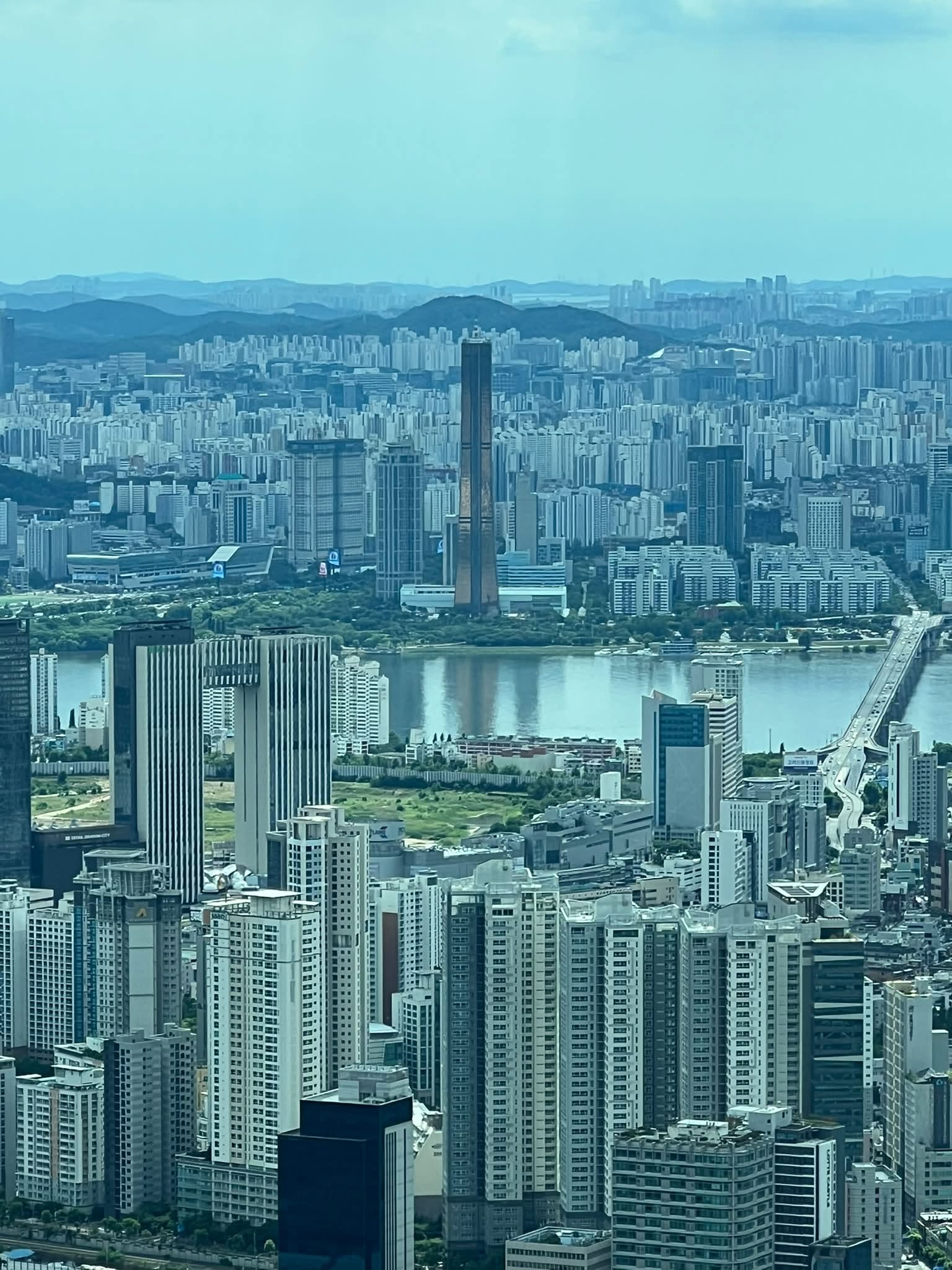 May be an image of Victoria Peak and skyscraper