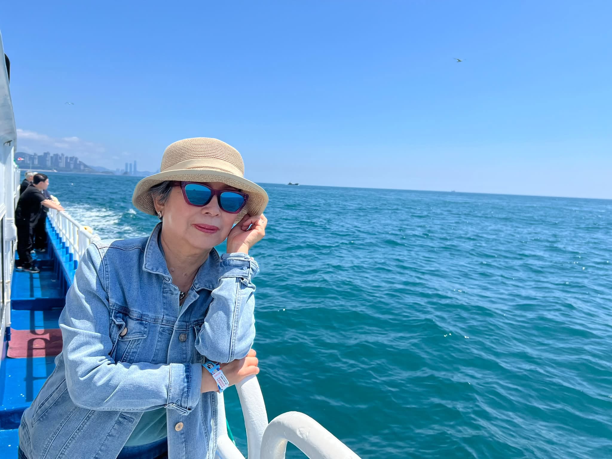 May be an image of boat, hat and ocean